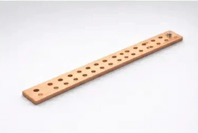 Narrow grounding busbar - for space-constrained installations