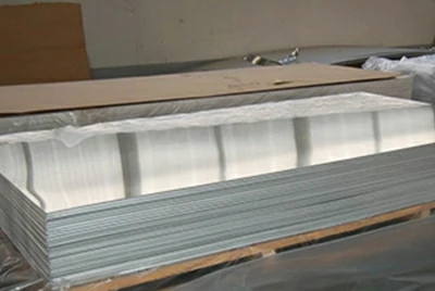 Palletized 3105 aluminum sheet bundles stored in warehouse racks