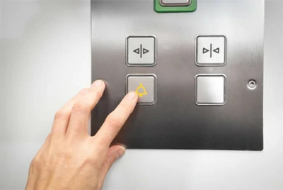 Elevator interiors, elevator buttons, and handrails