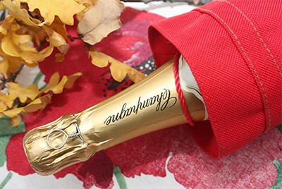 champagne bottle with gold foil capsule packaging