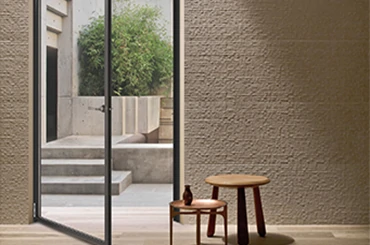 Ultra-thin hinged door for entrances and side doors, offering clean lines and natural light
