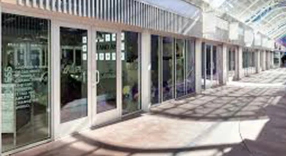 Flush front aluminum storefront system for modern brand store entrance