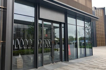 Double aluminum storefront doors for wide commercial entrance