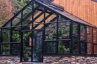 Gable roof aluminum sunroom with double pitch glass structure