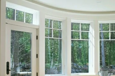 Aluminum clad hinged patio door with wood interior for luxury home
