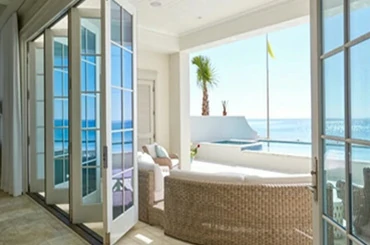 Aluminum clad bifold door for villa patio and indoor outdoor living space