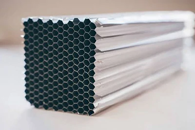 Energy absorption honeycomb core for controlled crushing and impact protection