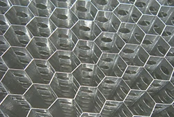 perforated honeycomb core for venting and pressure equalization