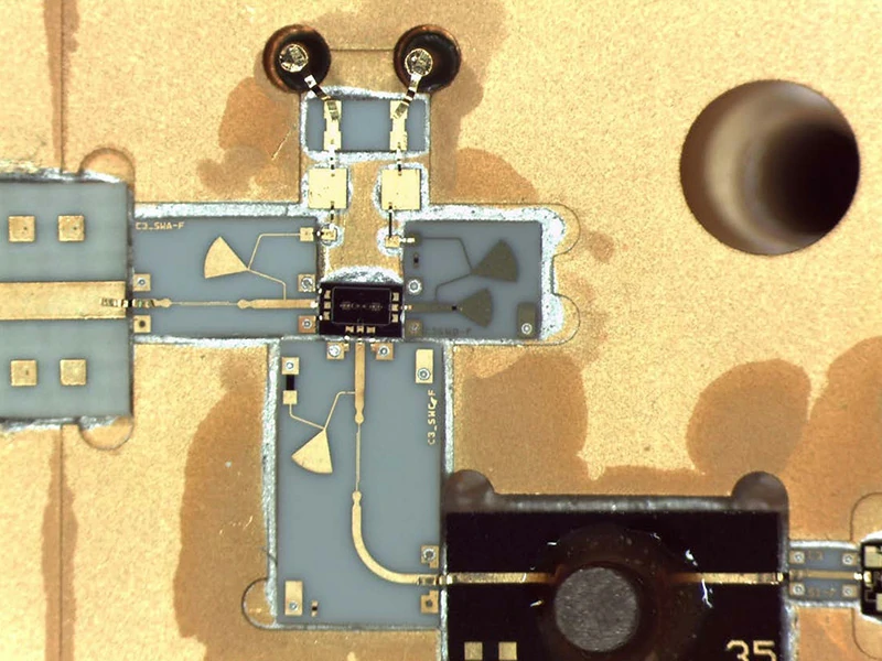 Gold bonding ribbon interconnects in a 34 GHz RF microwave module